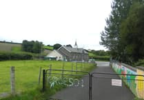 Under-threat village school praised by inspectors