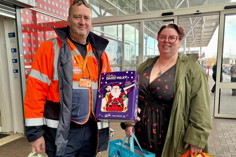 Phil helping deliver food to a Food Bank.