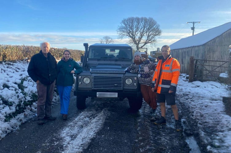 A 4x4 Response South Wales volunteer with their vehicle and passengers.