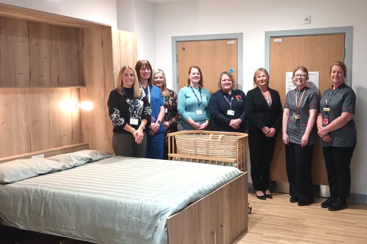 Pictured l-r: Hayley Vallance, Volunteer Carmarthenshire and Pembrokeshire Sands; Anwen Evans, Midwife; Dawn Thomas, Bereavement Manager; Astra Shipton, Volunteer Carmarthenshire and Pembrokeshire Sands; Sharon Davies, Assistant National Officer Wales, Royal College of Midwives; Sharon Daniel, Executive Director of Nursing, Quality & Patient Experience; Cerian Llewellyn, Head of Midwifery; Alison Jones, Clinical and Operational Lead Midwife