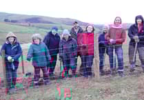 Talybont flood victims don wellies and shovels planting 40,000 trees to slow the flow