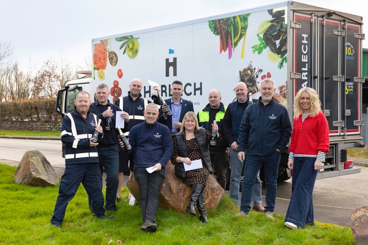 Harlech Foodservice have recognised the loyalty of several long-standing employees. Pictured right are directors Andrew and Laura Foskett with employees, from left, Paul Monaghan, Dylan Hughes, Ian Rogers, Gary McDonnell, Mike Clishem, Manon Lloyd Jones, Aled Owen and Paul Owen. Unable to be present were Huw Watkin-Griffith and Peter Jones.