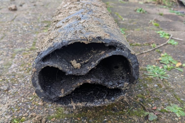 The 60-year-old pitch fibre pipe, lined with coal tar, had warped internally, blocking the flow.