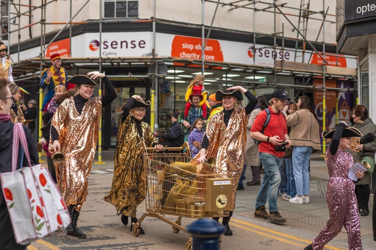 The town criers in action during Aberystwyth's Santes Dwynwen Parade. Photo: Isaac Peat