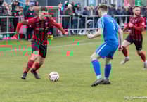 Porthmadog edge six‑goal battle as hat-trick hero Evans shines