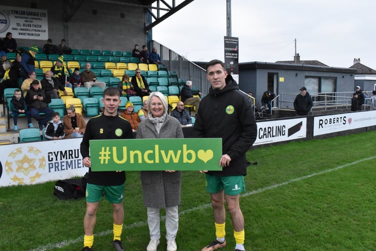 Siân Gwenllian MS with Caernarfon Town's Darren Thomas and Adam Davies