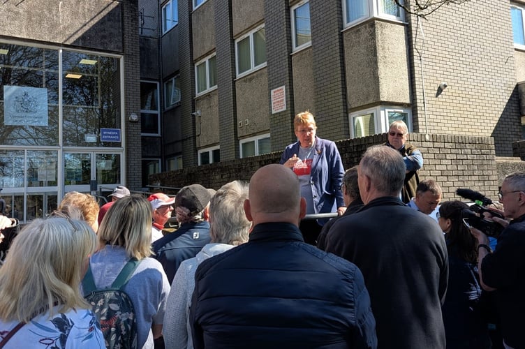 Ann Davies speaking outside the court in April, 2025.