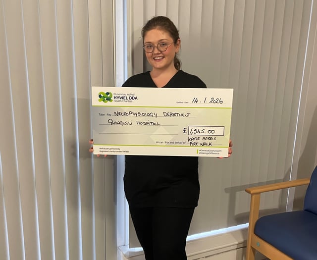 Fire Walk raises £1,500 for neurophysiology department