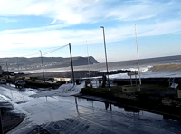 Calls to reprofile Borth beach after wave breaches