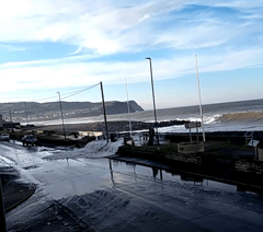 Calls to reprofile Borth beach after wave breaches