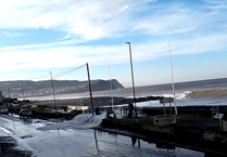 Calls to reprofile Borth beach after wave breaches