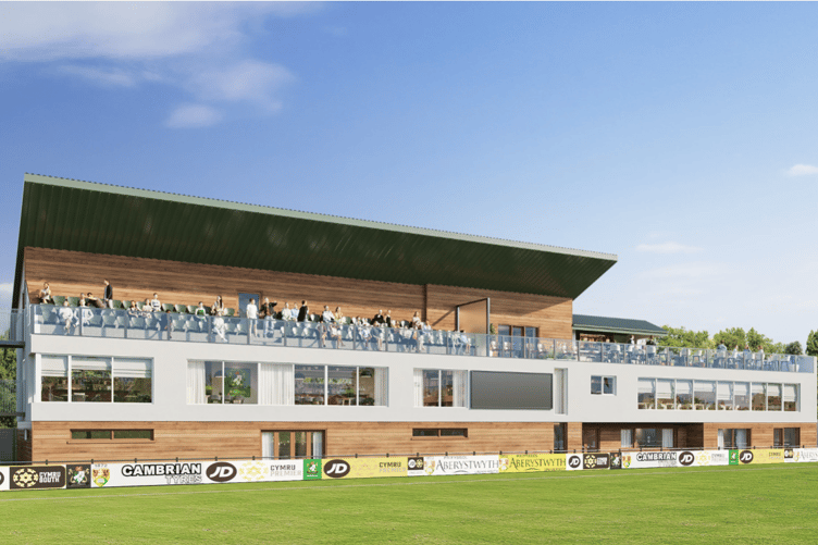 The plan includes a new two-and-a-half storey main building