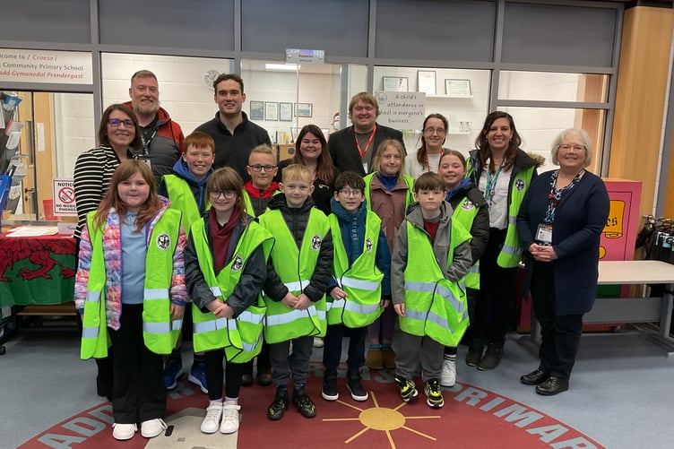 Pupils, staff, governors and parents from Prendergast, joined by Bethan Cook of FareShare Cymru, Henry Tufnell MP and Jonathan Wallcroft of FareShare UK.