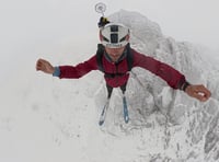 Tim Howell makes historic ski-BASE jump off Snowdon
