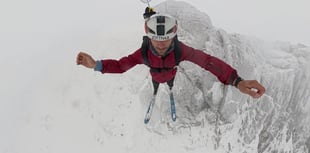 Tim Howell makes historic ski-BASE jump off Snowdon