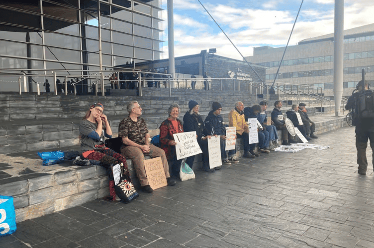 Sue (fifth from the right) amongst protestors outside the Senedd on 18 November, 2025.