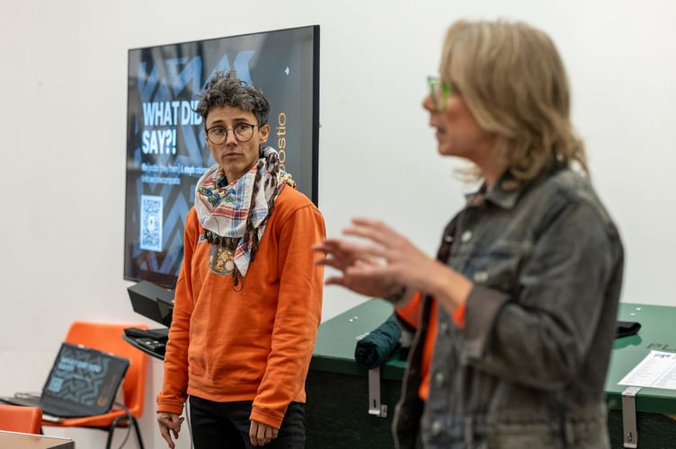 ffin and Steph speaking at an event. 