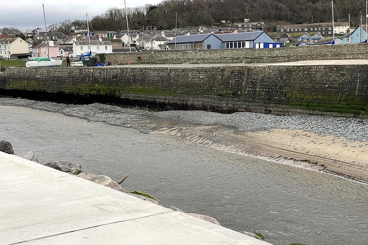 The dredged harbour entrance, beginning to collect shingle again two weeks after the dredging was completed. Photo: Robert Farmer