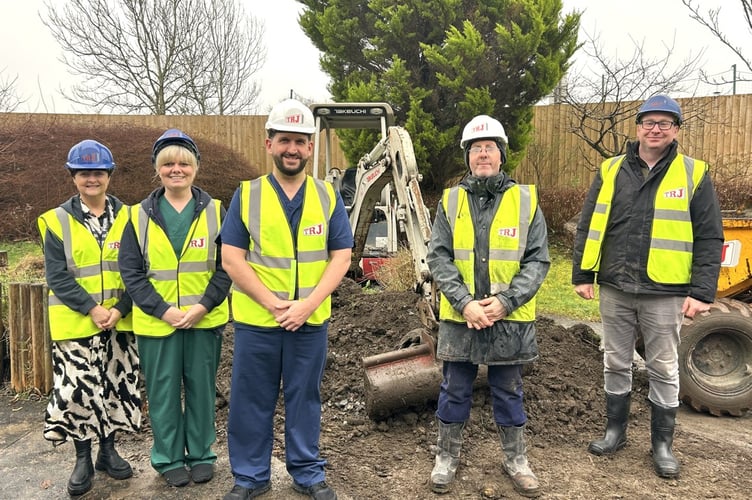 Staff from Mynydd Mawr and Bryngolau wards join the TRJ team to mark the start of construction work