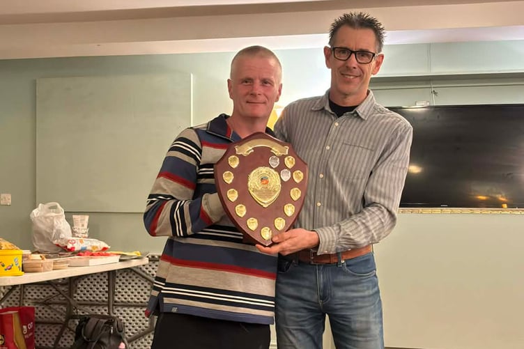 Paul Jones receiving his award from club captain Paul Williams