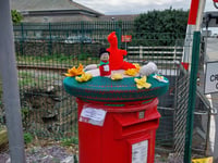 Barmouth WI celebrates St David's Day with post-box topper