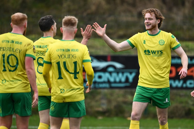 COLWYN BAY, WALES - 08 March 2026: Zack Clarke of Caernarfon Town celebrates his goal to make it 0-2 during the JD Welsh Cup Semi-Final between Rhyl 1879 and Caernarfon Town at The Blue Turtle Arena in Colwyn Bay (Pic by Craig Thomas/FAW)