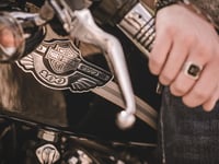Police officers investigate alleged assault by Harley Davidson riders