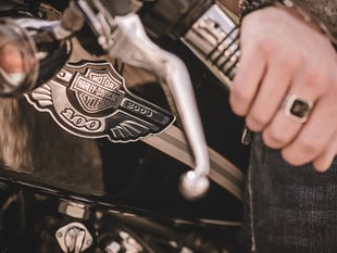 Police officers investigate alleged assault by Harley Davidson riders