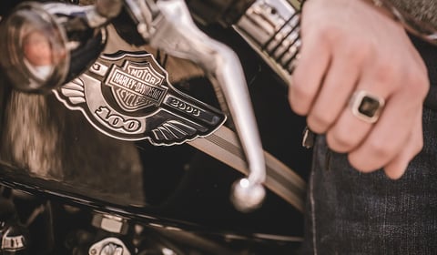 Police officers investigate alleged assault by Harley Davidson riders