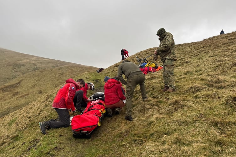 Aberdyfi Search and Rescue Team pic of woman with leg injury