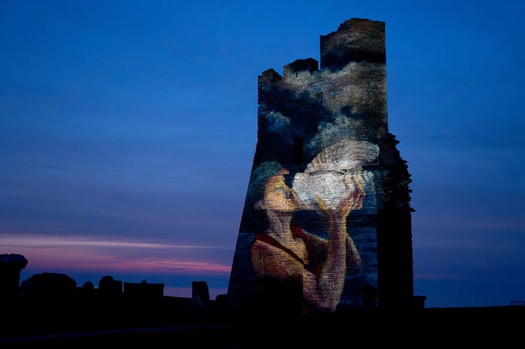 Artwork projected onto Aberystwyth castle. Photo: Angharad Bache