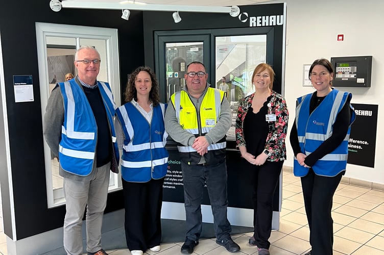 Cllrs Medwyn Hughes and Menna Trenholme, Dylan Roberts and Delyth Roberts from Rehau and Cllr Nia Jeffreys. Photo: Gwynedd Council