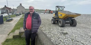 Council workers reprofiling Borth beach