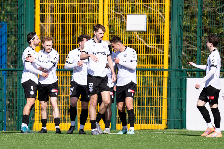 CARDIFF, WALES - 28 MARCH 2026: Cameron Ferguson of Bala Town celebrates scoring his sides first goal during the 2025/26 JD Cymru Premier match between Cardiff Met & Bala Town at Cyncoed Campus, Cardiff, Wales. (Pic by Lewis Mitchell/FAW)