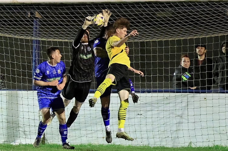 Goalmouth action from Porthmadog's 5-2 win at Llangefni