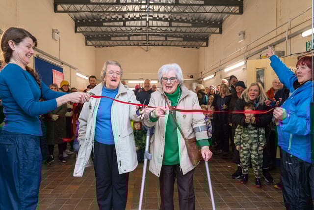 The ribbon was cut by the two oldest ‘children’ in the village, Flora Fowles, 92, and Bronwen Hugill-Gowers, 94. Photo: Paul Fowles