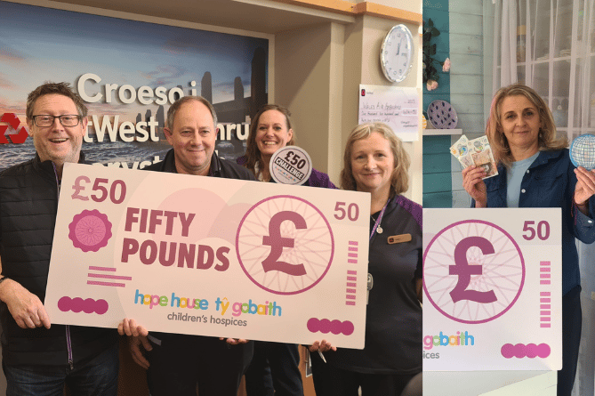 Staff from Aberystwyth's Natwest Bank, left, and Carys Boyle, right