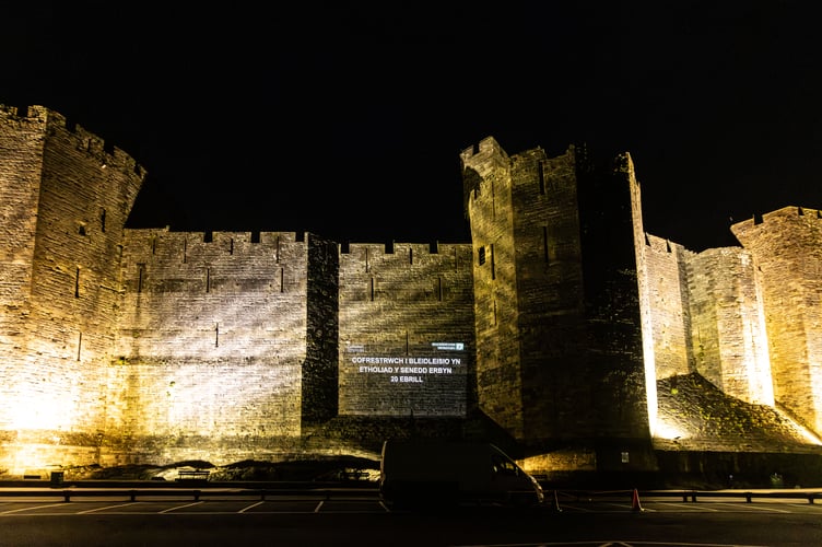 The Electoral Commission message encouraging people to register to vote was projected on the walls of Caernarfon Castle. Photo: The Electoral Commission