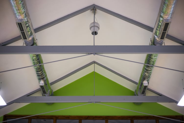 Destratification fans are also in use in Yr Aelwyd, circulating hot air so it doesn't rise and stay in the roof.