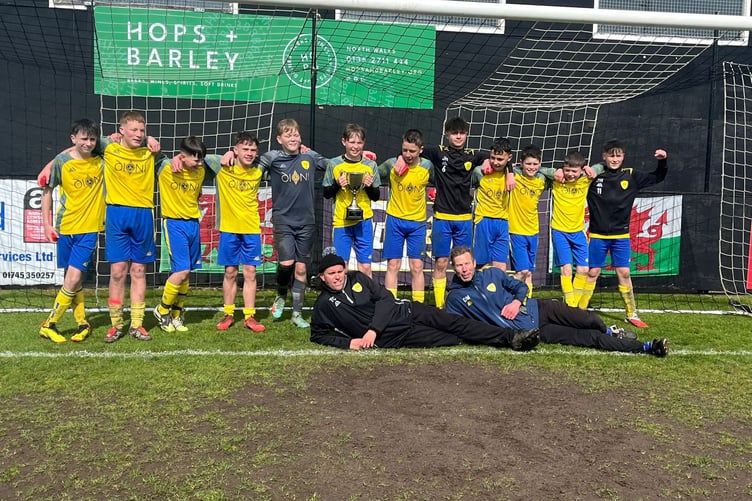 The talented young footballers with coaches Tyrone Carr and Dave Matthews