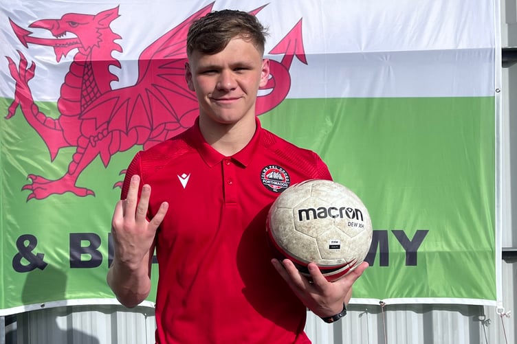 Hat-trick hero Osian Evans with the match ball