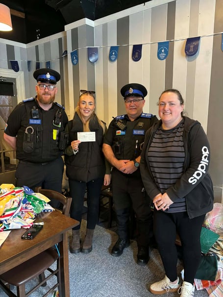 NWP Gwynedd South present the cheque to food festival organisers