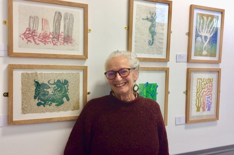 Judy Macklin, Chair of Aberystwyth Printmakers, and some of the work on display