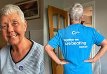 Former Cambrian News editor's squats raise over £450 for Cancer Research UK