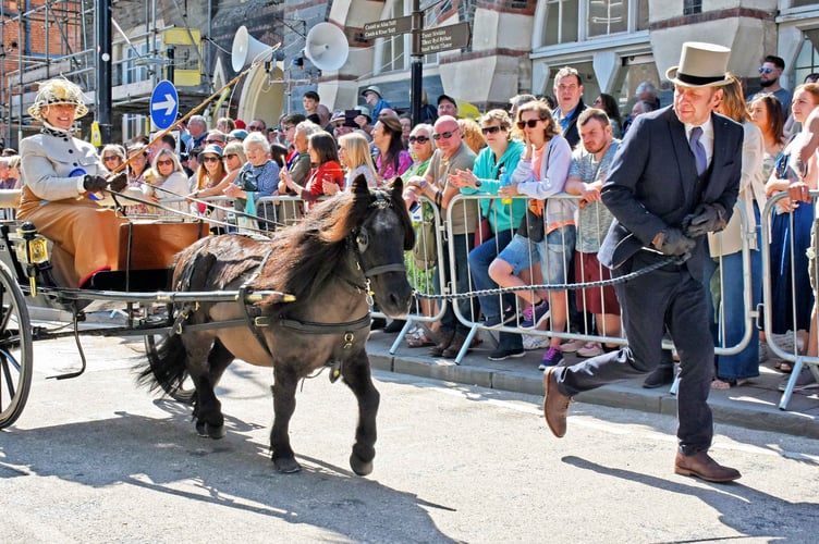 The parade included carriage horses