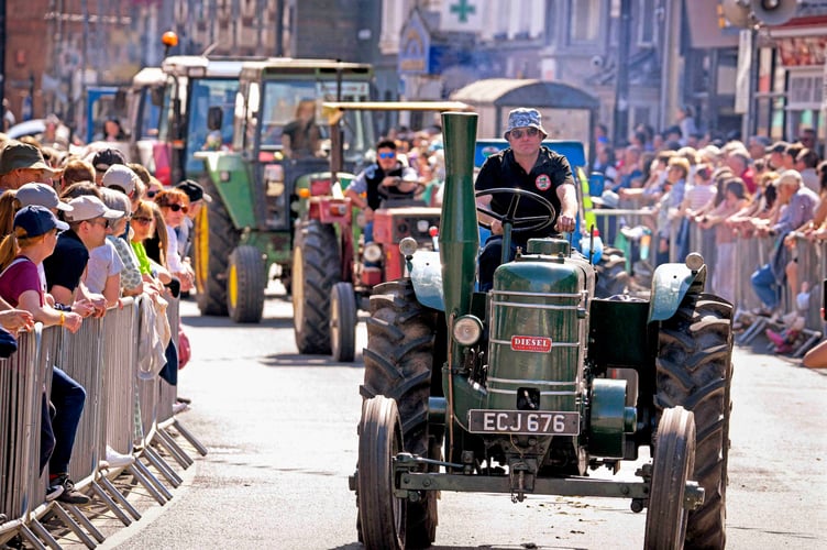 A Field Marshall tractor in the parade through the town