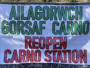 Which Senedd candidates would get one mid Wales station reopened?