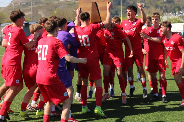 Celebrations as the trophy is lifted