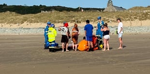 RNLI rescue four paddle boarders blown offshore