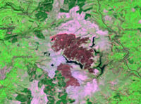 What is causing the unprecedented scale of Wales' wildfires?